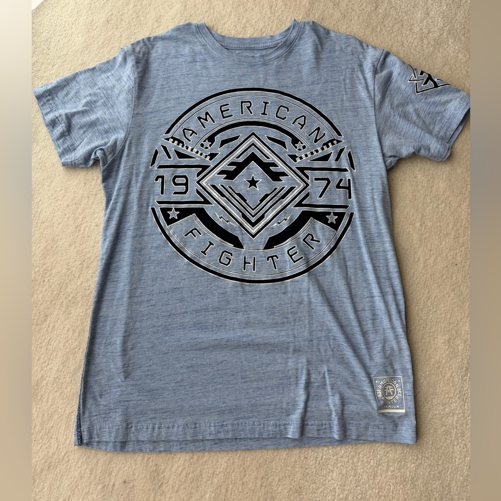 American Fighter for Buckle Light Heather Blue Emblem Tee Logo T-Shirt